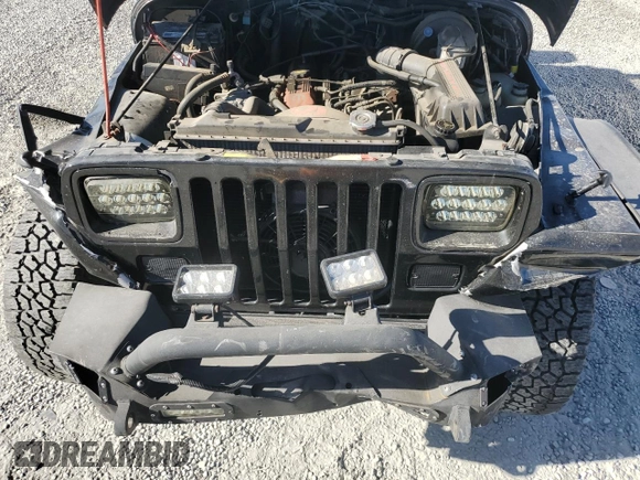 1995 Jeep Wrangler S with VIN 1J4FY19P7SP209782, listed as a Copart auction lot 84476294 with 157,029 mi miles and Salvage Title. Bid and sale history available at carsss.com. Image 11.