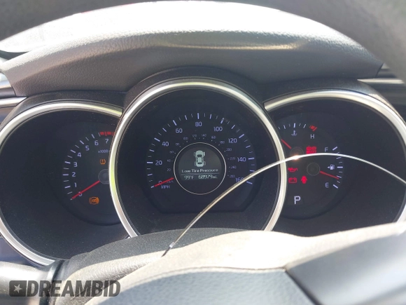 2014 Kia Optima LX with VIN 5XXGM4A76EG316577, listed as a IAAI auction lot 42594090 with 68,979 mi miles and . Bid and sale history available at DreamBid. Image 7.