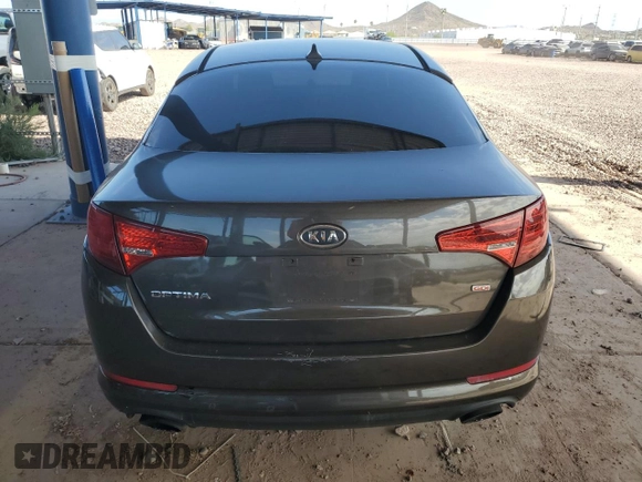 2011 Kia Optima LX z VIN KNAGM4A74B5131876, wystawiony jako Copart lot #69256644 z przebiegiem 117 718 mil mil oraz Szkoda całkowita • Salvage title. Historia ofert i sprzedaży dostępna na DreamBid. Obrazek 6.