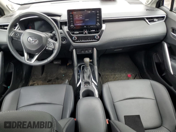 2022 Toyota Corolla Cross XLE with VIN 7MUDAABG6NV006829, listed as a Copart auction lot 55626965 with 23,187 mi miles and Salvage title. Bid and sale history available at DreamBid. Image 8.