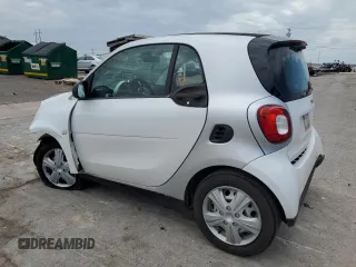 2016 Smart fortwo Passion with VIN WMEFJ5DAXGK084125, listed as a Copart auction lot 59374855 with 63,826 mi miles and Salvage title. Bid and sale history available at DreamBid. Image 2.