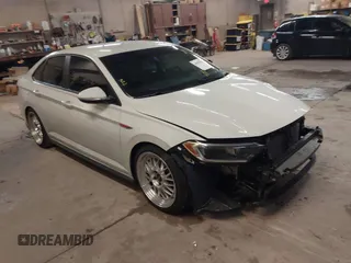 2019 Volkswagen Jetta GLI S with VIN 3VW5T7BU6KM261054, listed as a IAAI auction lot 40956960 with 56,784 mi miles and . Bid and sale history available at DreamBid. Image 1.