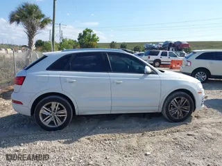 2018 Audi Q3 Premium with VIN WA1BCCFS6JR010047, listed as a IAAI auction lot 41795209 with 99,609 mi miles. Bid and sale history available at carsss.com. Image 13.