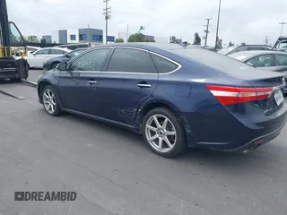 2013 Toyota Avalon XLE with VIN 4T1BK1EBXDU028403, listed as a IAAI auction lot 41545852 with 147,668 mi miles and . Bid and sale history available at DreamBid. Image 3.