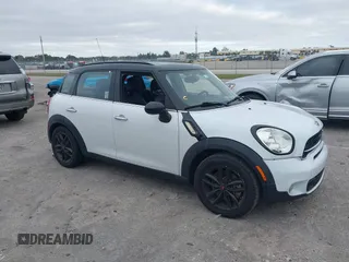 2015 MINI Countryman S z VIN WMWZC3C5XFWP53190, wystawiony jako IAAI lot #41273123 z przebiegiem 163 658 mil mil oraz . Historia ofert i sprzedaży dostępna na DreamBid. Obrazek 1.