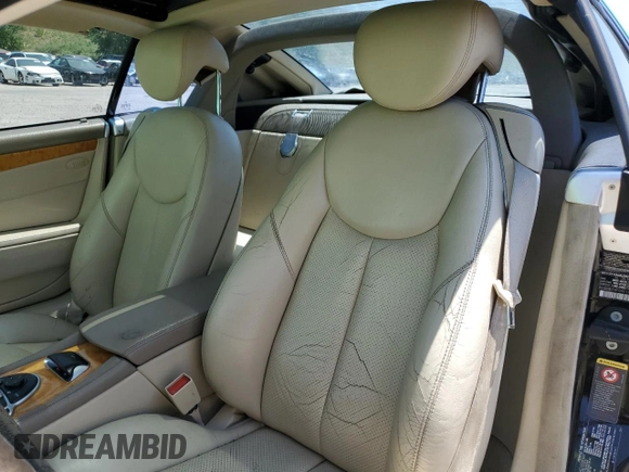 2006 Mercedes-Benz SL 500 with VIN WDBSK75F06F109541, listed as a Copart auction lot 61430545 with 106,428 mi miles and Salvage title. Bid and sale history available at DreamBid. Image 10.