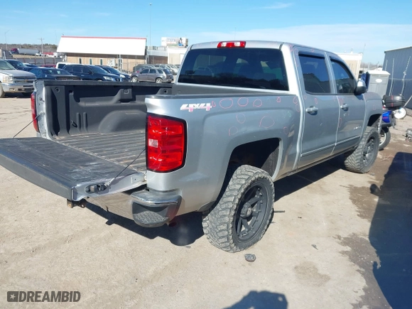 2015 Chevrolet Silverado 1500 LT with VIN 3GCUKREH1FG269823, listed as a IAAI auction lot 41398008 with 210,788 mi miles. Bid and sale history available at carsss.com. Image 4.