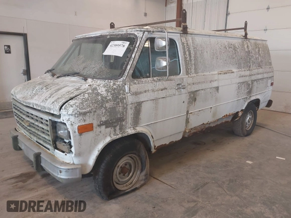 1992 Chevrolet Chevy Van z VIN 2GCEG25Z3N4144138, wystawiony jako IAAI lot #42389578 z przebiegiem 129 513 mil mil oraz . Historia ofert i sprzedaży dostępna na DreamBid. Obrazek 2.