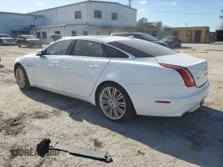 2013 Jaguar XJ Supercharged with VIN SAJWA2GE3DMV45811, listed as a Copart auction lot 76585864 with 53,570 mi miles and Salvage title. Bid and sale history available at DreamBid. Image 2.