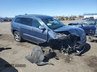 2020 Jeep Grand Cherokee Overland with VIN 1C4RJFCG0LC236053, listed as a Copart auction lot 49517905 with 65,861 mi miles and Salvage Title. Bid and sale history available at carsss.com. Image 4.