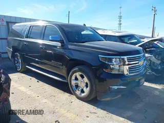 2015 Chevrolet Suburban LTZ with VIN 1GNSCKKC3FR249956, listed as a IAAI auction lot 41306605 with 122,942 mi miles and . Bid and sale history available at DreamBid. Image 1.