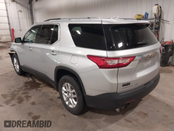 2018 Chevrolet Traverse LT Cloth z VIN 1GNEVGKW9JJ144070, wystawiony jako IAAI lot #42118002 z przebiegiem 142 006 mil mil oraz . Historia ofert i sprzedaży dostępna na DreamBid. Obrazek 3.