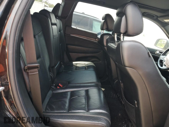 2014 Jeep Grand Cherokee Limited с VIN 1C4RJFBT0EC410818, выставлен на аукционе Copart как лот 59967155 с пробегом 129 880 миль миль и Списание • Salvage title. История ставок и продаж доступна на DreamBid. Изображение 11.
