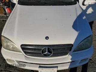 2003 Mercedes-Benz M-Class 3.7L with VIN 4JGAB57E53A408520, listed as a Copart auction lot 77715394 with 260,467 mi miles and Clean Title. Bid and sale history available at carsss.com. Image 11.