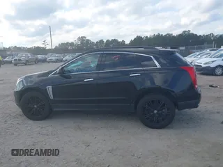 2014 Cadillac SRX z VIN 3GYFNAE35ES652370, wystawiony jako IAAI lot #40984924 z przebiegiem 211 588 mil mil oraz . Historia ofert i sprzedaży dostępna na DreamBid. Obrazek 14.