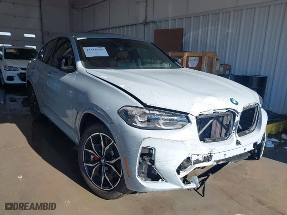 2023 BMW X4 M40i with VIN 5UX43DT03P9R26280, listed as a IAAI auction lot 41318355 with 21,587 mi miles. Bid and sale history available at carsss.com. Image 1.