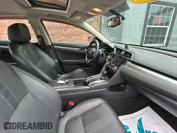 2017 Honda Civic EX-L с VIN 19XFC1F76HE013074, выставлен на аукционе Copart как лот 60144655 с пробегом 121 493 миль миль и Чистый • Clean title. История ставок и продаж доступна на DreamBid. Изображение 5.