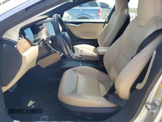 2016 Tesla Model S 90D с VIN 5YJSA1E23GF144496, выставлен на аукционе Copart как лот 64080845 с пробегом 34 847 миль миль и Списание • Salvage title. История ставок и продаж доступна на DreamBid. Изображение 7.
