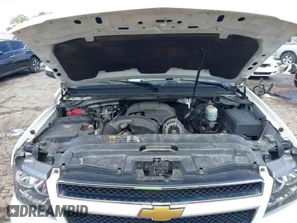 2014 Chevrolet Suburban LT with VIN 1GNSCJE07ER211222, listed as a IAAI auction lot 42428084 with 214,712 mi miles and . Bid and sale history available at DreamBid. Image 10.
