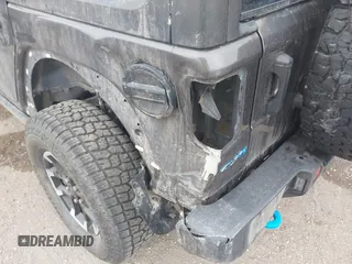 2024 Jeep Wrangler Rubicon z VIN 1C4RJXR67RW276710, wystawiony jako IAAI lot #42047318 z przebiegiem 35 857 mil mil oraz . Historia ofert i sprzedaży dostępna na DreamBid. Obrazek 6.