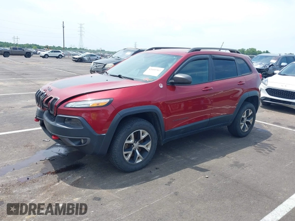 2014 Jeep Cherokee Trailhawk with VIN 1C4PJMBS7EW162357, listed as a IAAI auction lot 42601903 with 104,768 mi miles and . Bid and sale history available at DreamBid. Image 17.