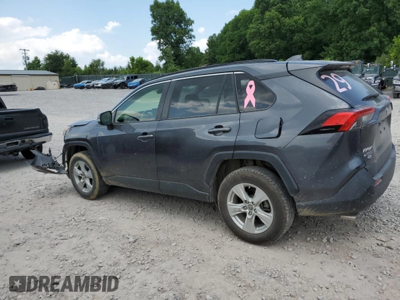 2019 Toyota RAV4 XLE with VIN JTMP1RFV8KD013125, listed as a Copart auction lot 59328465 with 106,947 mi miles and Salvage title. Bid and sale history available at DreamBid. Image 2.