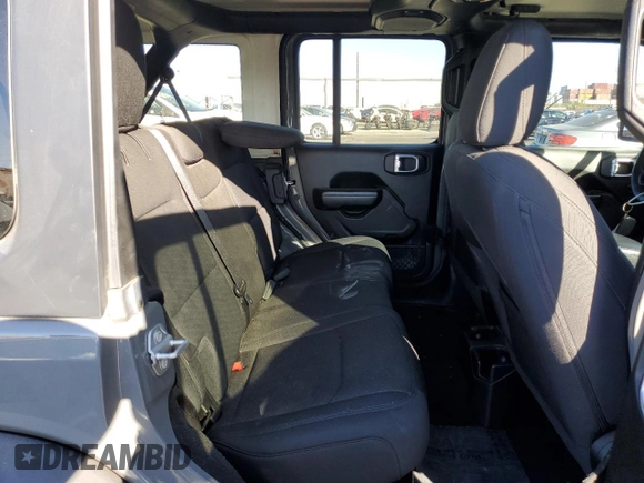 2020 Jeep Wrangler Unlimited Willys with VIN 1C4HJXDG5LW348507, listed as a Copart auction lot 77000574 with 57,056 mi miles and Salvage title. Bid and sale history available at DreamBid. Image 11.