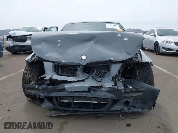 2006 BMW 3 Series 325i with VIN WBAVB13566PT14715, listed as a IAAI auction lot 41938484 with 188,552 mi miles. Bid and sale history available at carsss.com. Image 6.
