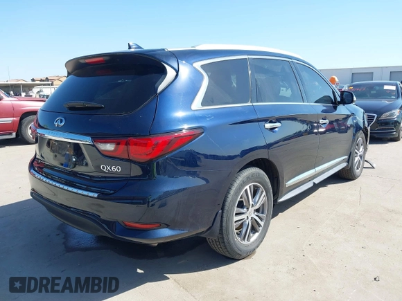2020 Infiniti QX60 Pure with VIN 5N1DL0MN1LC506501, listed as a IAAI auction lot 41968177 with 53,128 mi miles and . Bid and sale history available at DreamBid. Image 4.