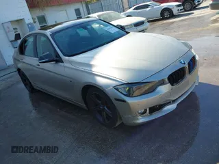 2015 BMW 3 Series 320i with VIN WBA3B1G58FNT03373, listed as a IAAI auction lot 41843859 with 98,439 mi miles. Bid and sale history available at carsss.com. Image 1.