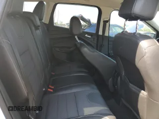 2014 Ford Escape SE z VIN 1FMCU9G92EUC58400, wystawiony jako Copart lot #60491005 z przebiegiem 72 462 mil mil oraz Szkoda całkowita • Salvage title. Historia ofert i sprzedaży dostępna na DreamBid. Obrazek 11.