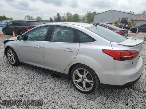2016 Ford Focus Titanium with VIN 1FADP3J22GL354941, listed as a Copart auction lot 54401135 with 144,142 mi miles and Salvage title. Bid and sale history available at DreamBid. Image 2.