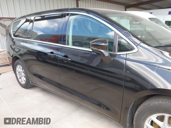 2023 Chrysler Pacifica Touring L with VIN 2C4RC1BG1PR550628, listed as a IAAI auction lot 42553430 with 61,773 mi miles and . Bid and sale history available at DreamBid. Image 14.