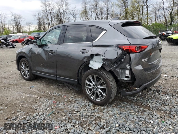 2019 Mazda CX-5 Signature with VIN JM3KFBEY3K0521581, listed as a Copart auction lot 53112925 with 62,977 mi miles and Salvage Title. Bid and sale history available at carsss.com. Image 2.