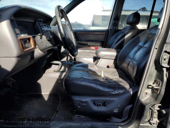 1997 Jeep Grand Cherokee Limited with VIN 1J4GZ78Y1VC563890, listed as a Copart auction lot 41910925 with 0 mi miles and Clean Title. Bid and sale history available at carsss.com. Image 7.