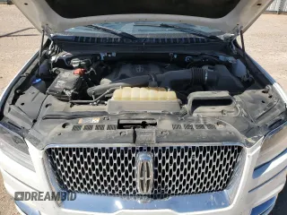 2020 Lincoln Navigator Black Label z VIN 5LMJJ3TT7LEL01308, wystawiony jako Copart lot #73700704 z przebiegiem 70 838 mil mil oraz Szkoda całkowita • Salvage title. Historia ofert i sprzedaży dostępna na DreamBid. Obrazek 13.
