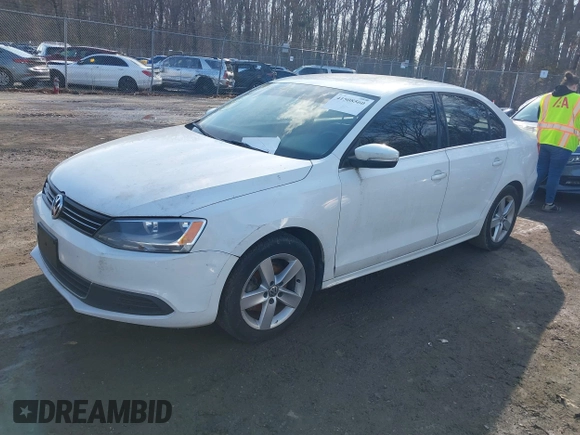 2014 Volkswagen Jetta TDI w/Premium/Nav with VIN 3VWLL7AJ0EM281741, listed as a IAAI auction lot 41508560 with 148,000 mi miles and . Bid and sale history available at DreamBid. Image 2.