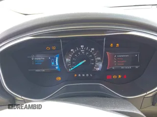 2016 Ford Fusion Titanium Hybrid with VIN 3FA6P0RU5GR171287, listed as a IAAI auction lot 41918195 with 74,721 mi miles. Bid and sale history available at carsss.com. Image 7.