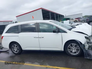 2012 Honda Odyssey EX-L with VIN 5FNRL5H60CB134954, listed as a IAAI auction lot 41942488 with 192,069 mi miles and . Bid and sale history available at DreamBid. Image 14.