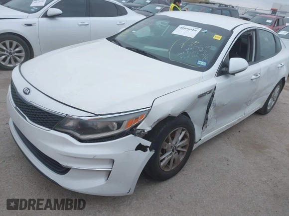 2016 Kia Optima LX with VIN KNAGT4L39G5104726, listed as a IAAI auction lot 40950914 with 128,728 mi miles. Bid and sale history available at carsss.com. Image 6.