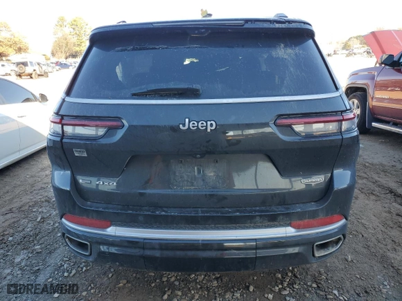 2021 Jeep Grand Cherokee L Summit Reserve with VIN 1C4RJKET9M8197423, listed as a Copart auction lot 84758234 with 105,805 mi miles and Salvage Title. Bid and sale history available at carsss.com. Image 6.