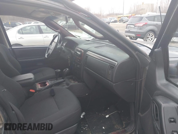 2002 Jeep Grand Cherokee Laredo with VIN 1J4GW48S92C294116, listed as a IAAI auction lot 42080375 with 154,108 mi miles and . Bid and sale history available at DreamBid. Image 5.