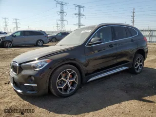 2019 BMW X1 xDrive28i with VIN WBXHT3C59K5L90348, listed as a Copart auction lot 48406515 with 66,292 mi miles and Salvage Title. Bid and sale history available at carsss.com. Image 1.
