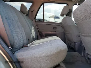 2000 Toyota 4Runner SR5 z VIN JT3GN86R4Y0159902, wystawiony jako Copart lot #57287845 z przebiegiem 174 742 mil mil oraz Szkoda całkowita • Salvage title. Historia ofert i sprzedaży dostępna na DreamBid. Obrazek 11.