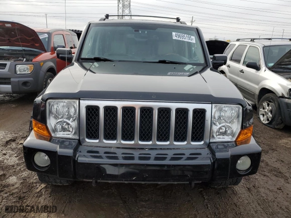 2007 Jeep Commander Overland with VIN 1J8HG68287C657766, listed as a Copart auction lot 49695195 with 153,561 mi miles and Salvage Title. Bid and sale history available at carsss.com. Image 5.