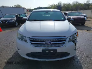 2012 Ford Taurus Limited z VIN 1FAHP2FW1CG103595, wystawiony jako IAAI lot #41913906 z przebiegiem 308 496 mil mil oraz . Historia ofert i sprzedaży dostępna na DreamBid. Obrazek 12.