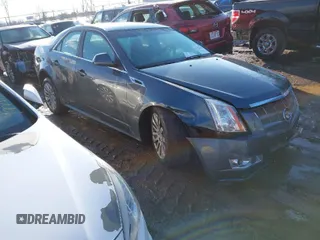 2011 Cadillac CTS Performance with VIN 1G6DL5EDXB0129385, listed as a IAAI auction lot 41633144 with 122,146 mi miles and . Bid and sale history available at DreamBid. Image 1.