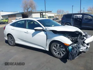 2018 Honda Civic EX with VIN 2HGFC2F71JH502564, listed as a IAAI auction lot 41933157 with 56,696 mi miles and . Bid and sale history available at DreamBid. Image 13.