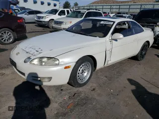 1995 Lexus SC with VIN JT8JZ31C0S0031335, listed as a Copart auction lot 79499844 with 194,867 mi miles and Salvage title. Bid and sale history available at DreamBid. Image 1.
