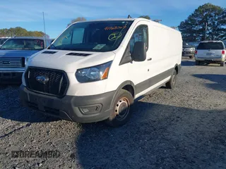 2024 Ford Transit Cargo with VIN 1FTYE1Y83RKA07711, listed as a IAAI auction lot 41768067 with 22,587 mi miles. Bid and sale history available at carsss.com. Image 17.